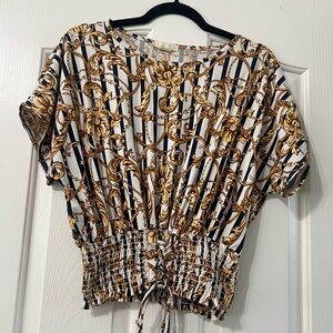 Elegant Women's Blouse with Gold and Black Pattern